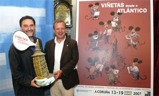 Miguel Anxo Prado, coordinador do salón do cómic, con Carlos González Garcés, concelleiro de Festas